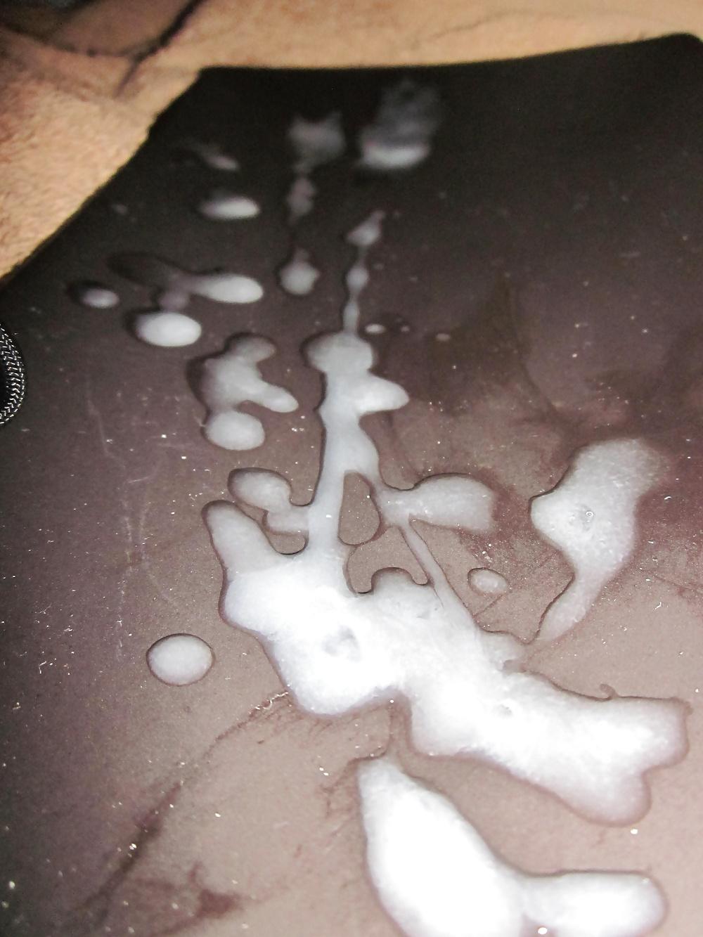 6P Close up cum shot on a black plate