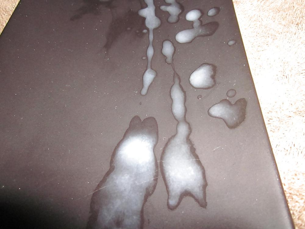 6P Close up cum shot on a black plate