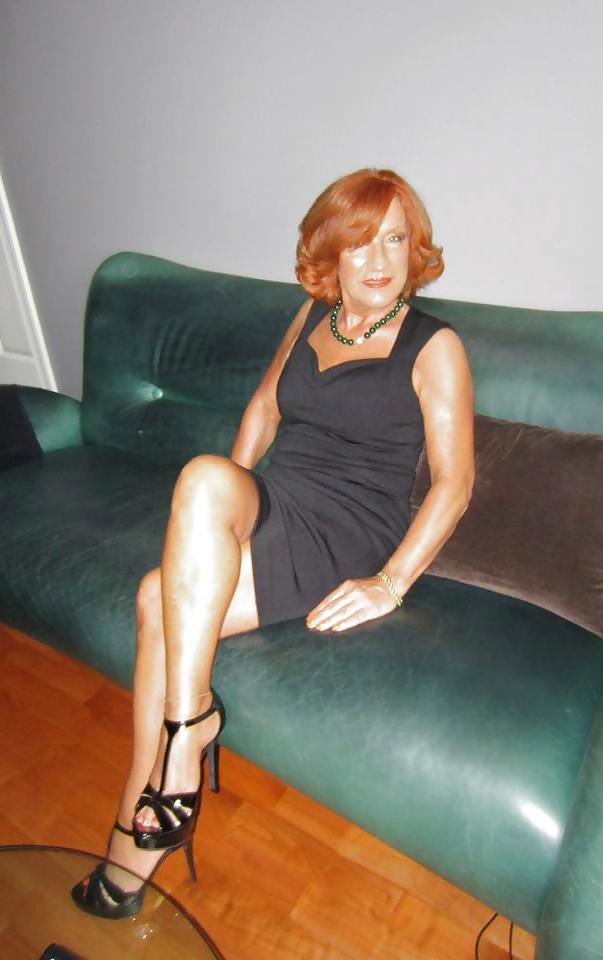 21P Sexy Redhead Mature Lady