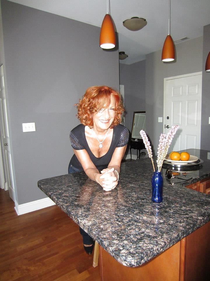 21P Sexy Redhead Mature Lady