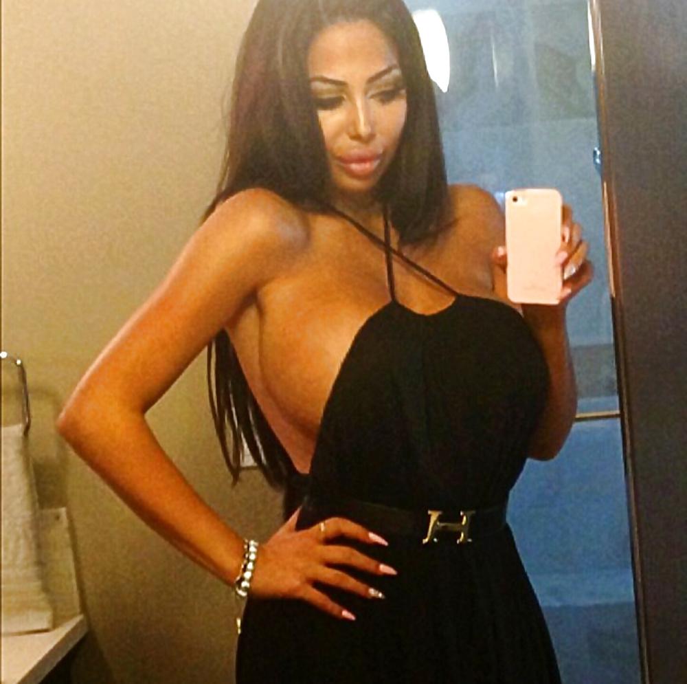 17P Fake big plastic titted greek slut