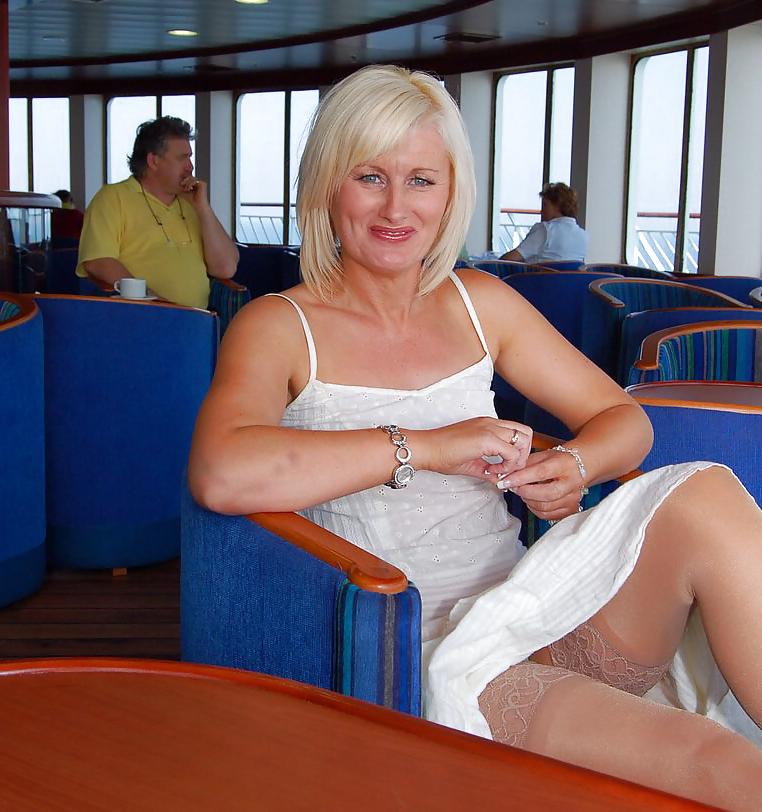 25P Older lady travels poses outdoors