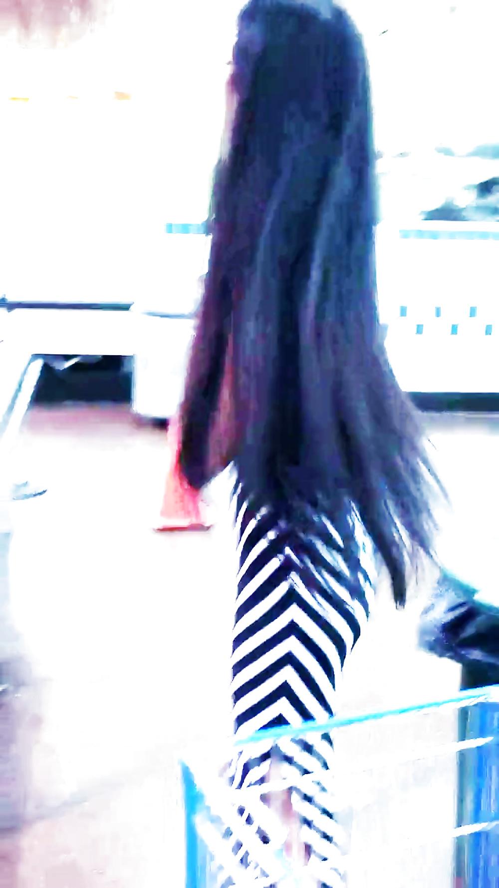 12P Sexy filipino babe in long striped skirt shopping for meat