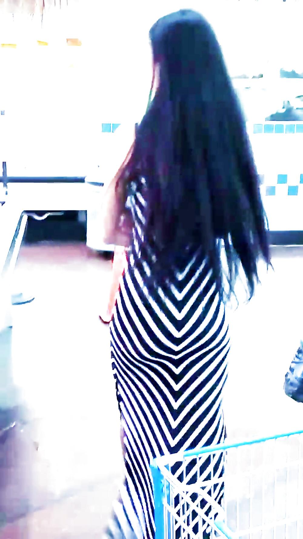 12P Sexy filipino babe in long striped skirt shopping for meat