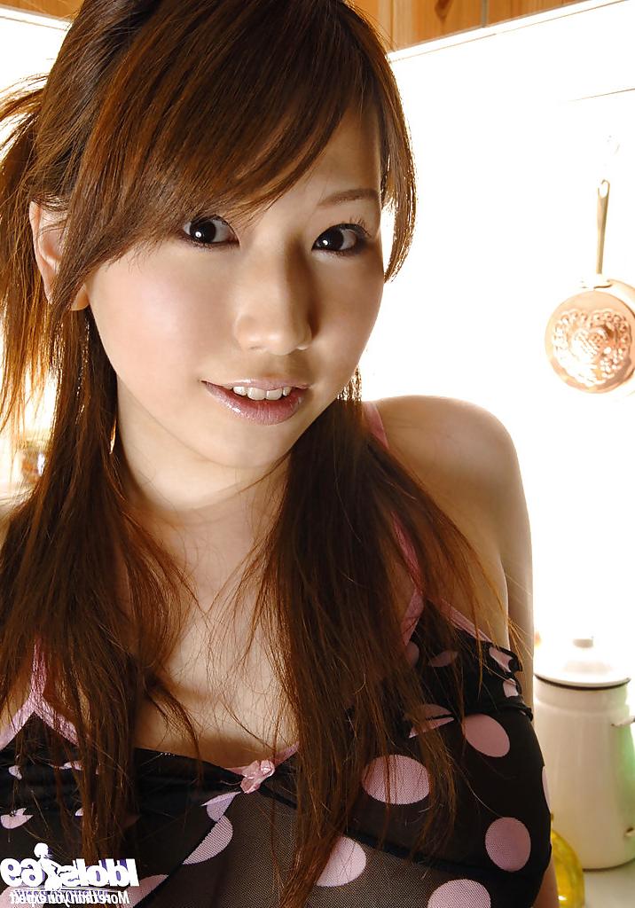 15P Stunning asian babe with big tits Ai Sayama stripping in the kitchen