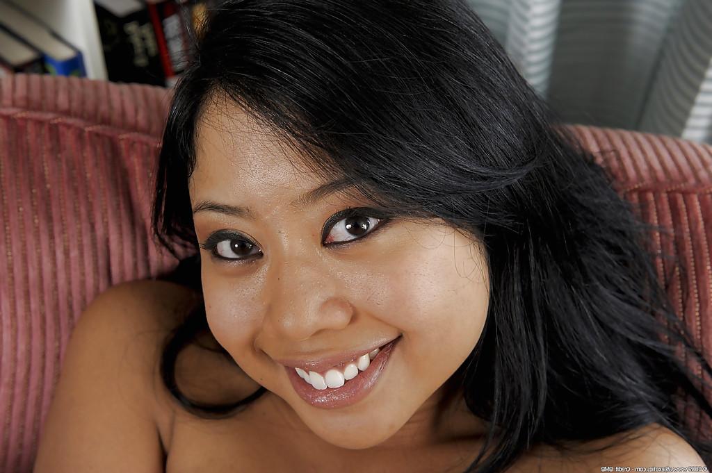 16P Black haired Asian Kya loves to show off her big sexy titties