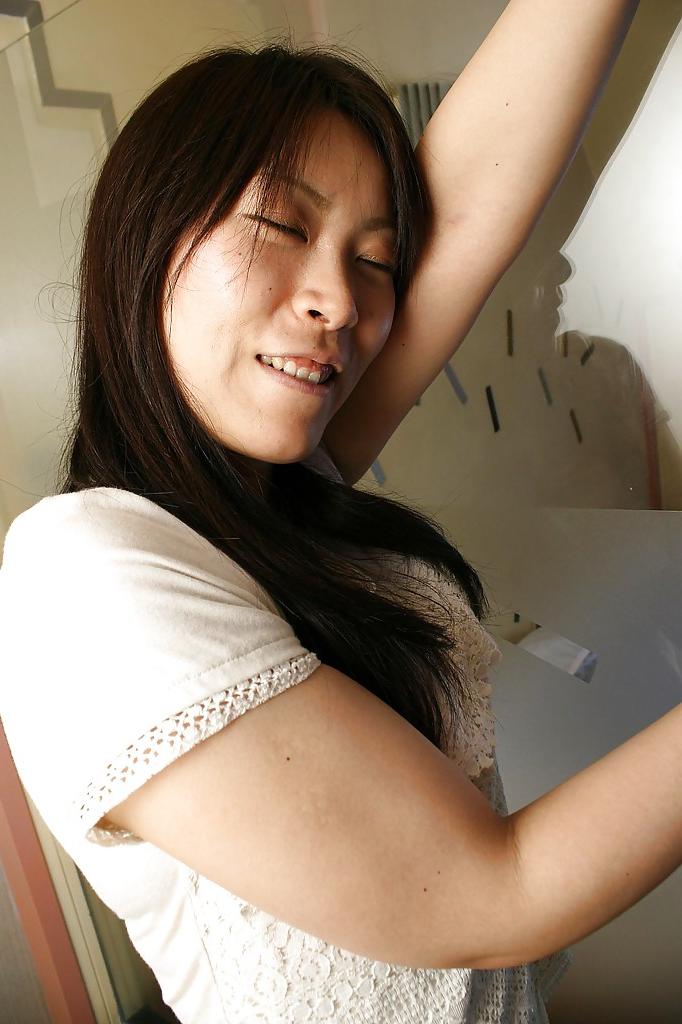 16P Shy asian chick strips down and showcases her hairy twat in close up