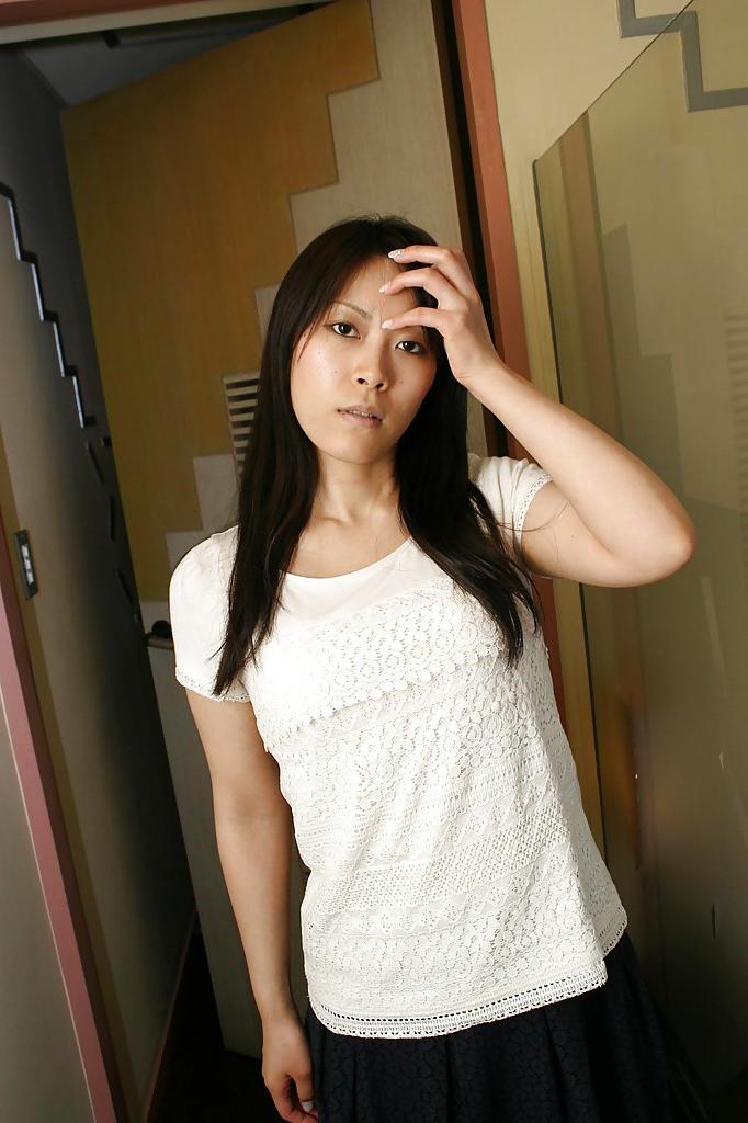 16P Shy asian chick strips down and showcases her hairy twat in close up