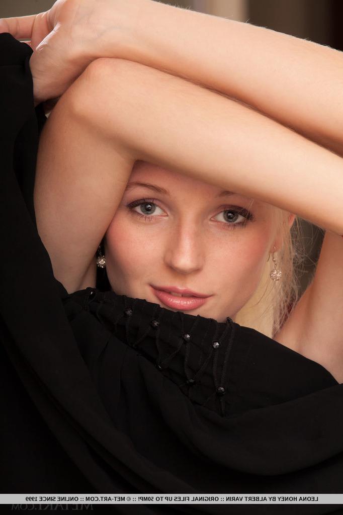 18P Skinny blonde teen Leona Honey showing off sexy legs and shaved teen pussy