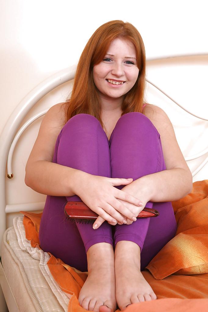 16P Redhead teen with massive jugs stripping and fingering her hairy twat