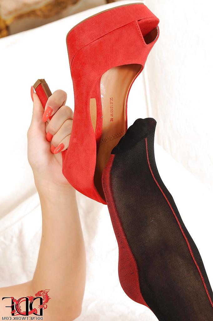 16P Stockings model Blanche Bradburry is showing her sexy legs in high heels