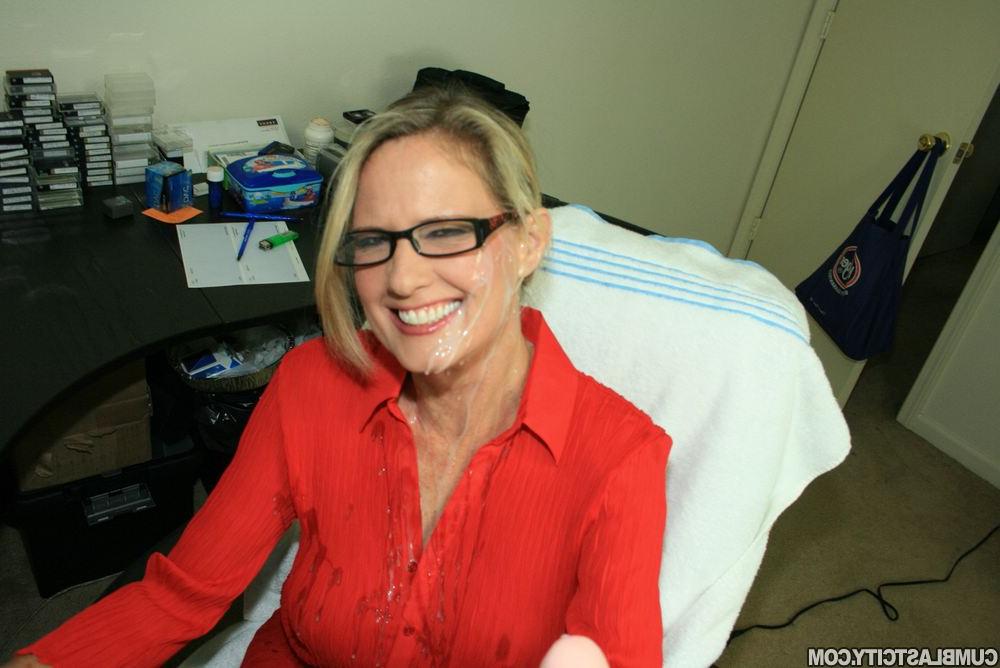 16P Fully clothed mature blonde in glasses gives a handjob and gets bukkaked