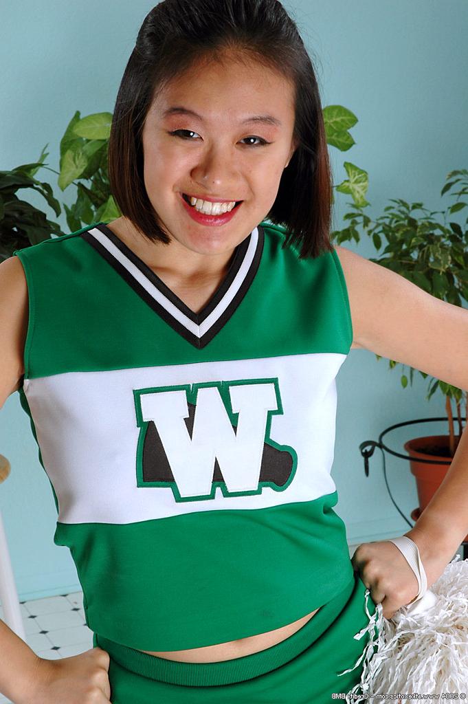 16P Amateur Asian cheerleader baring big butt and tits before spreading beaver