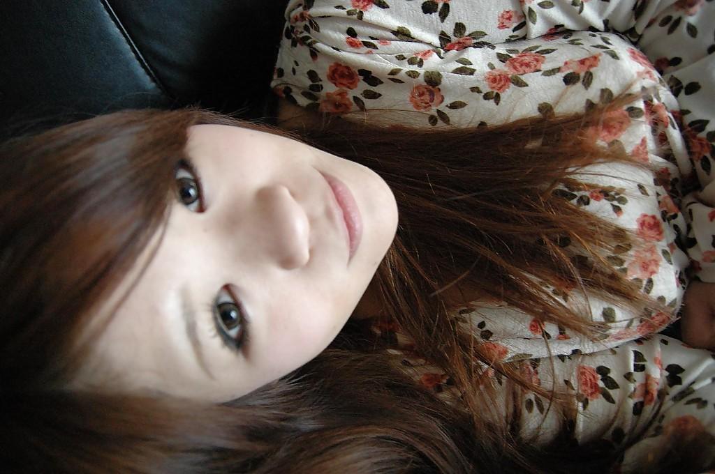 16P Smiley asian teen Reina Fukumoto undressing and posing nude on the bed