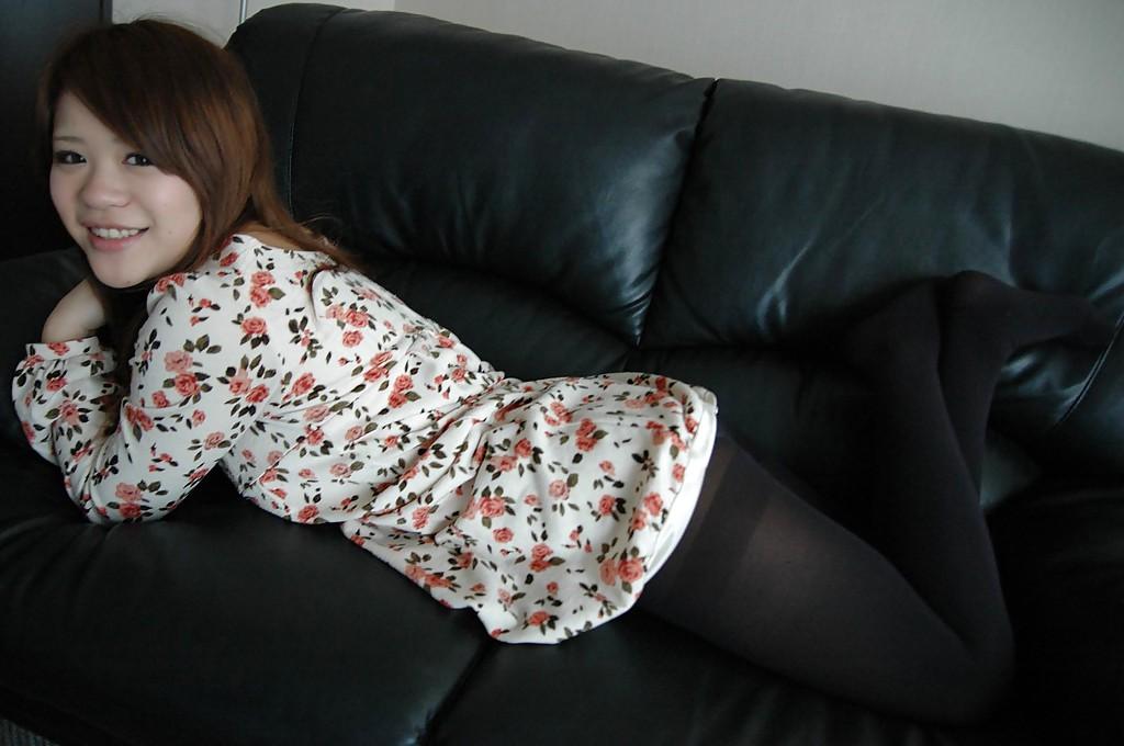 16P Smiley asian teen Reina Fukumoto undressing and posing nude on the bed