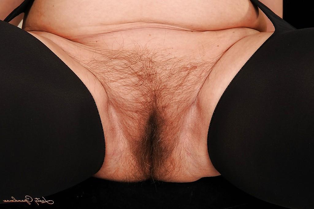 16P Fatty granny in stockings taking off her lingerie and spreading her legs
