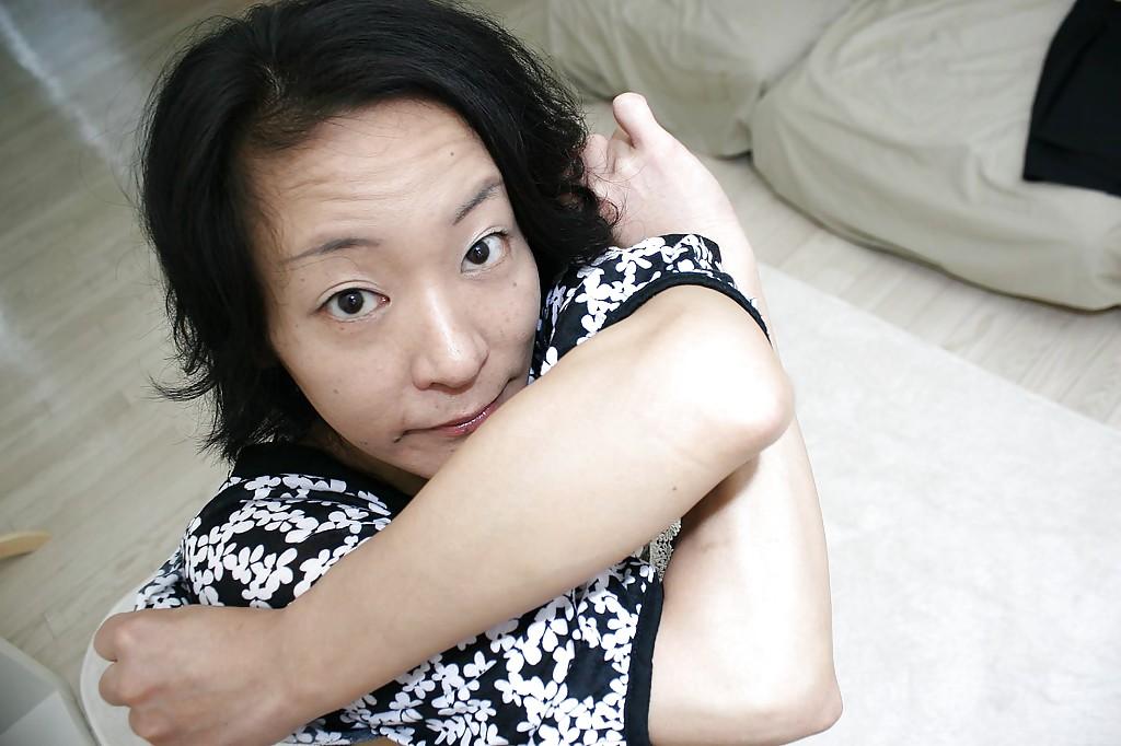 16P Naughty asian MILF Aya Sakuma undressing and exposing her holes