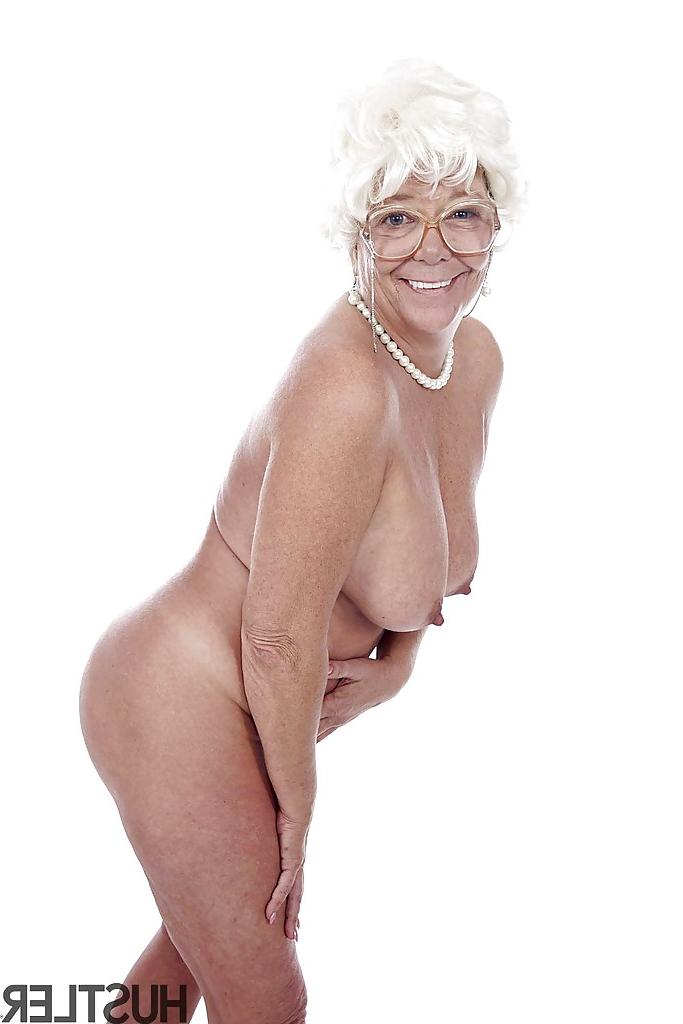 16P Granny pornstar Karen Summer modelling fully clothed before stripping naked