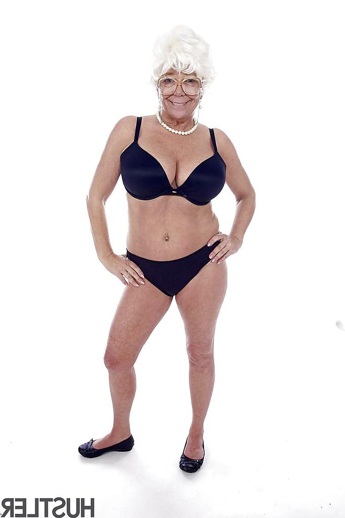 16P Granny pornstar Karen Summer modelling fully clothed before stripping naked