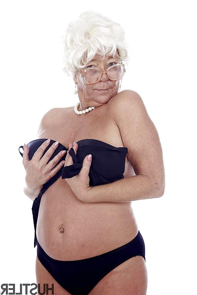 16P Granny pornstar Karen Summer modelling fully clothed before stripping naked