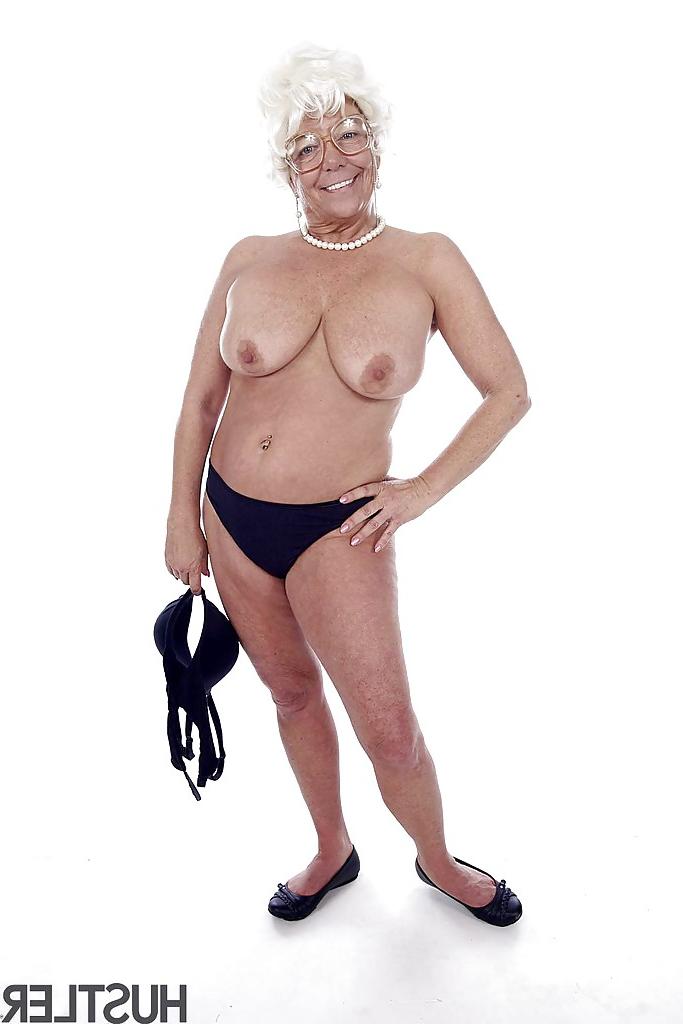 16P Granny pornstar Karen Summer modelling fully clothed before stripping naked