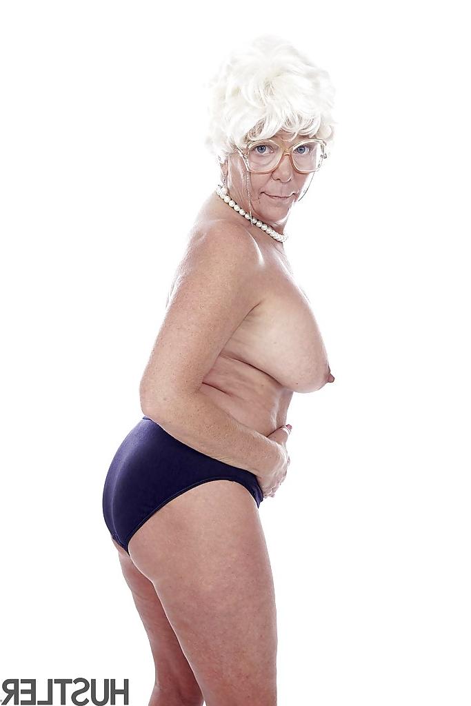 16P Granny pornstar Karen Summer modelling fully clothed before stripping naked