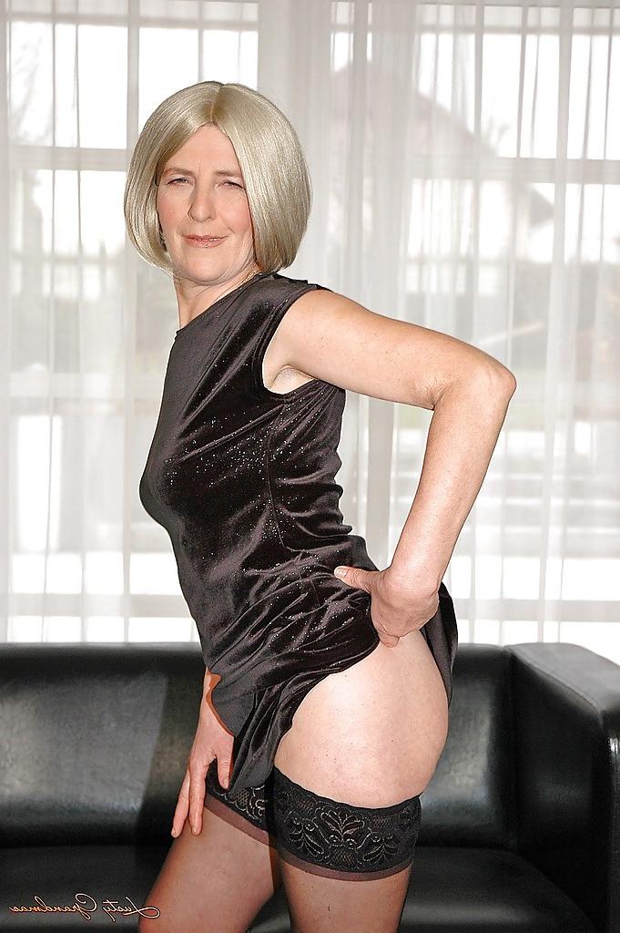 16P Blonde granny in stockings shows off her hairy pussy under lingerie
