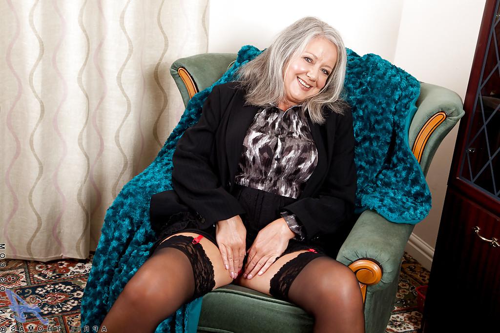 16P Chubby granny in stockings reveals her sexy lingerie and plays with herself