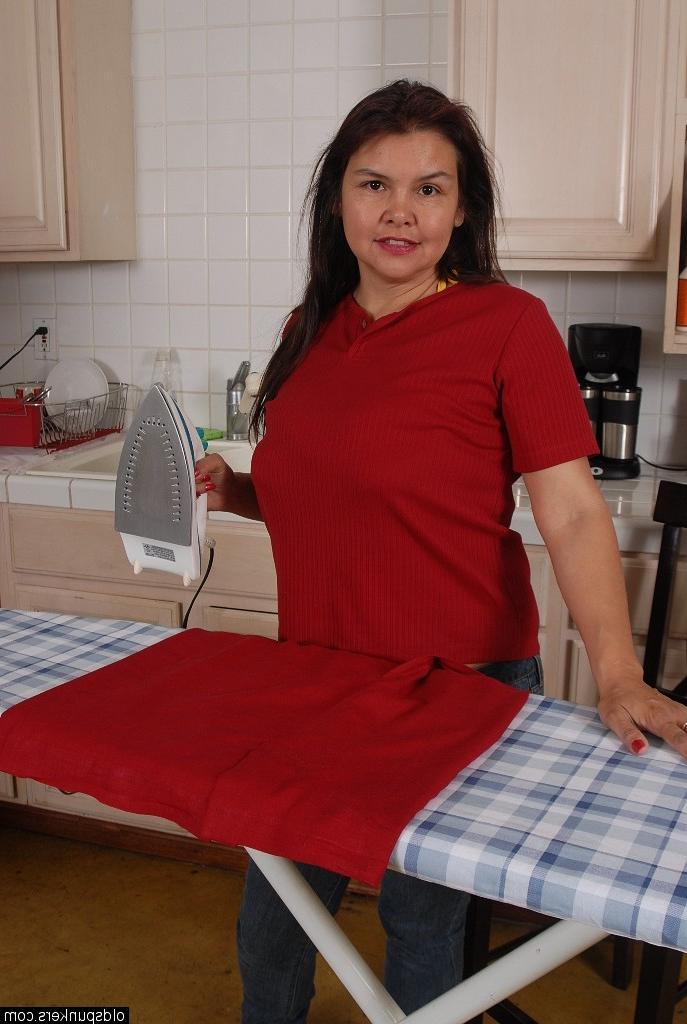 16P Granny Patty is playing with her big saggy boobies in the kitchen