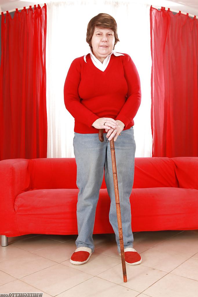 16P Lecherous granny with massive flabby jugs stripping and exposing her twat