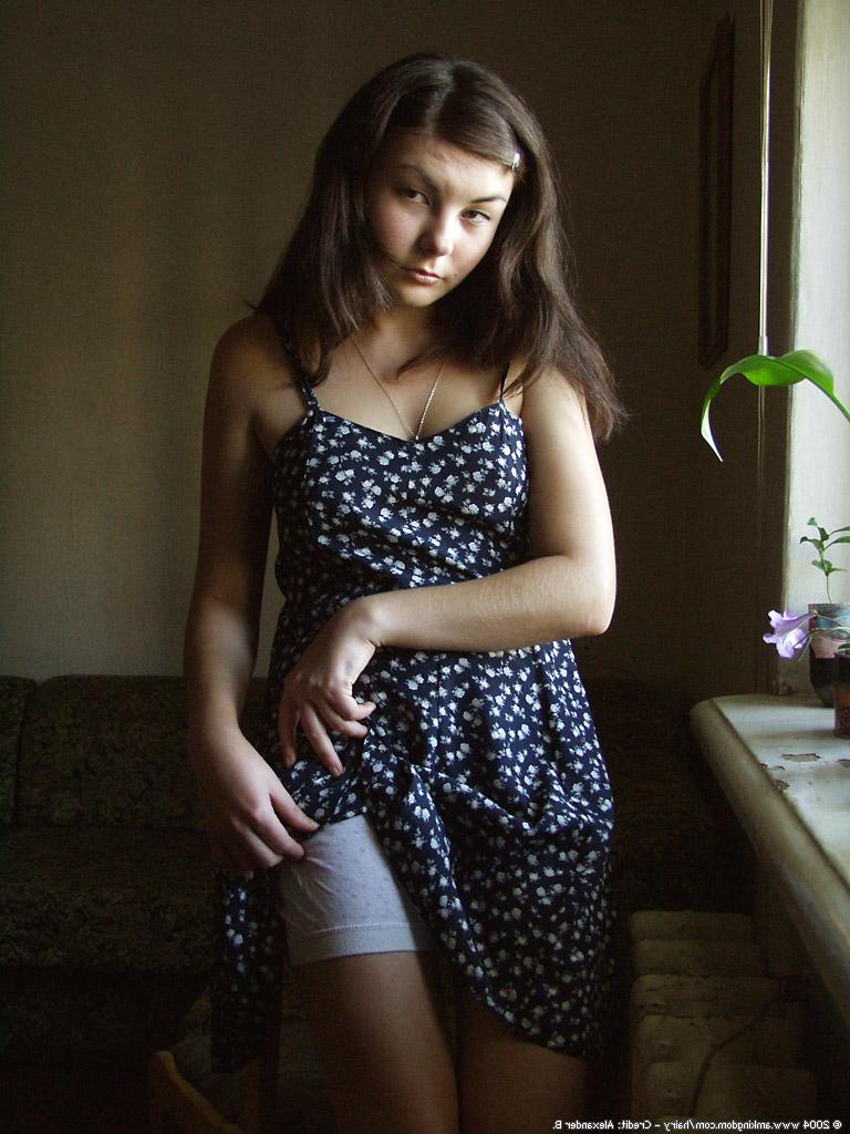16P Horny young amateur babe Katta taking off her clothes and posing