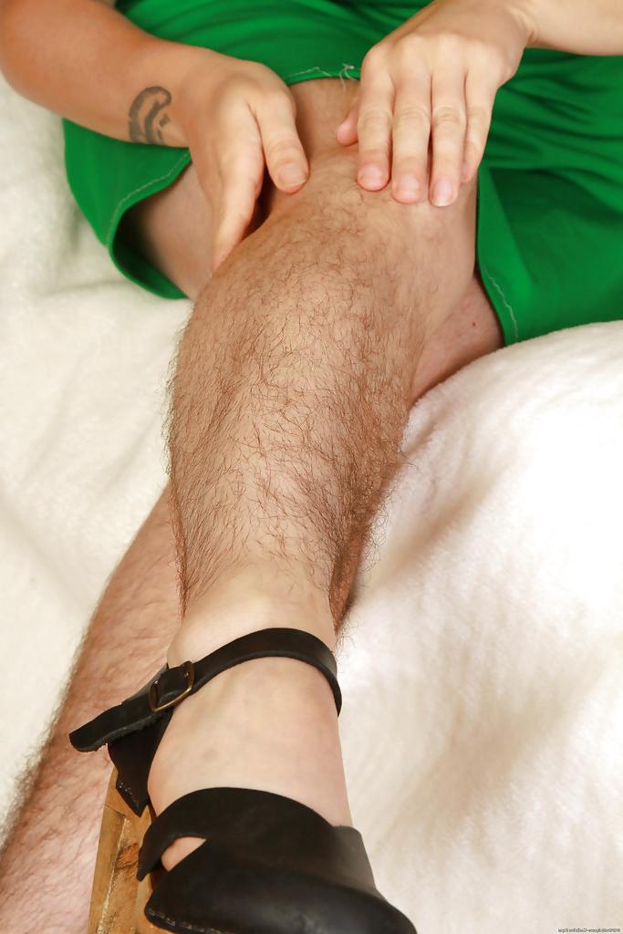 16P Redhead mature slut with hairy legs and private parts stripping down
