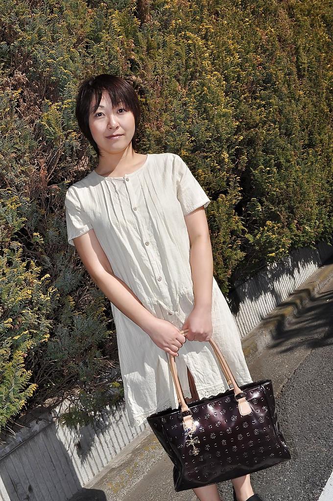 16P Chubby asian MILF Masae Shimatani undressing and playing with herself