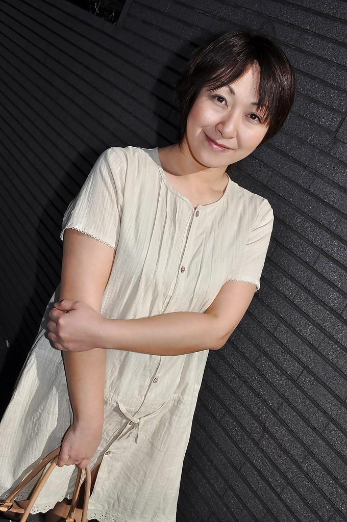 16P Chubby asian MILF Masae Shimatani undressing and playing with herself