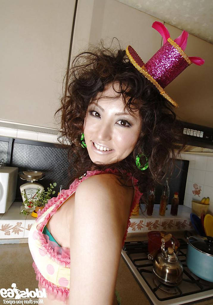15P Sexy amateur asian babe Takako Kitahara uncovering her tempting curves