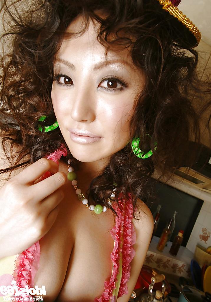 15P Sexy amateur asian babe Takako Kitahara uncovering her tempting curves