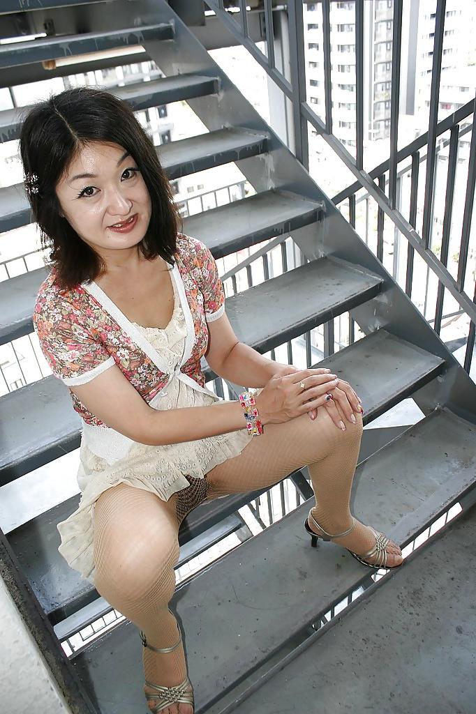 16P Asian MILF Chiyo Yamabe lowering her panties and exposing her hairy slit