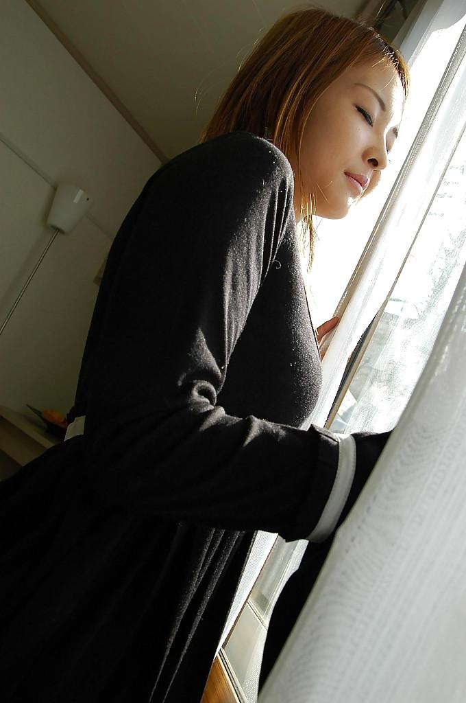 16P Asian babe Chie Kudou undressing and exposing her hairy cunt in close up