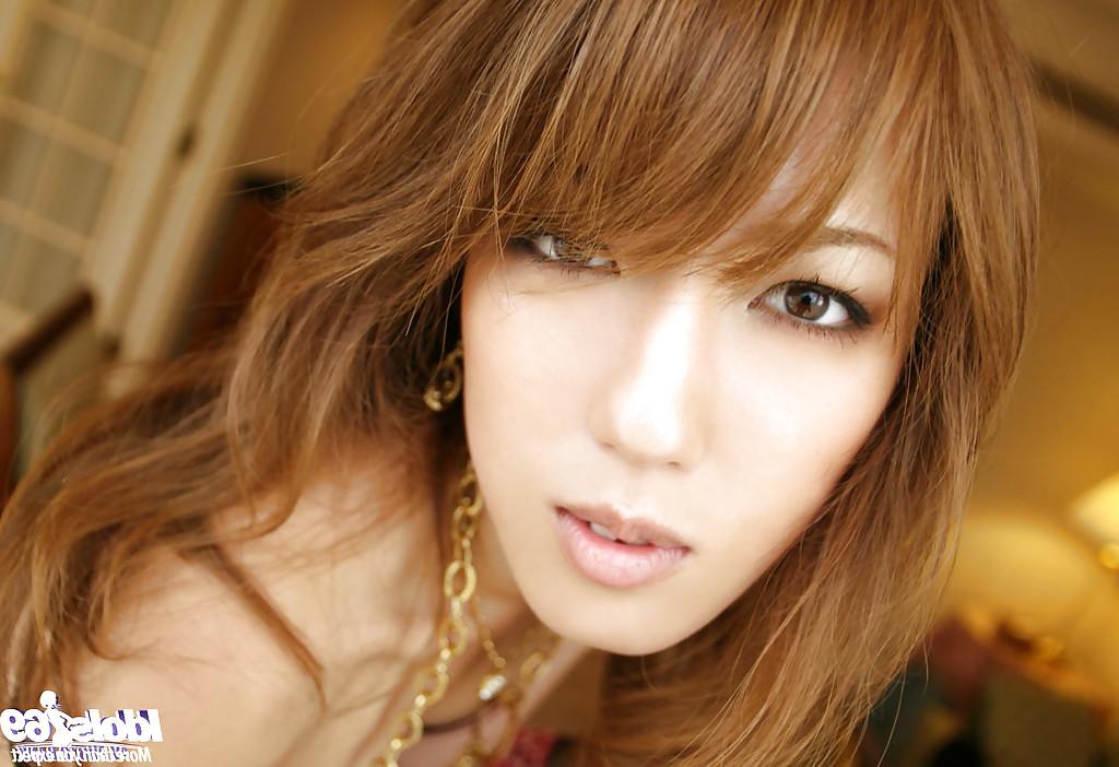 16P Filthy asian teen girl in stockings teasing her slit and stripping