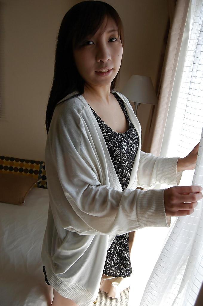 16P Lusty asian lady Mai Toda getting naked and spreading her pussy lips