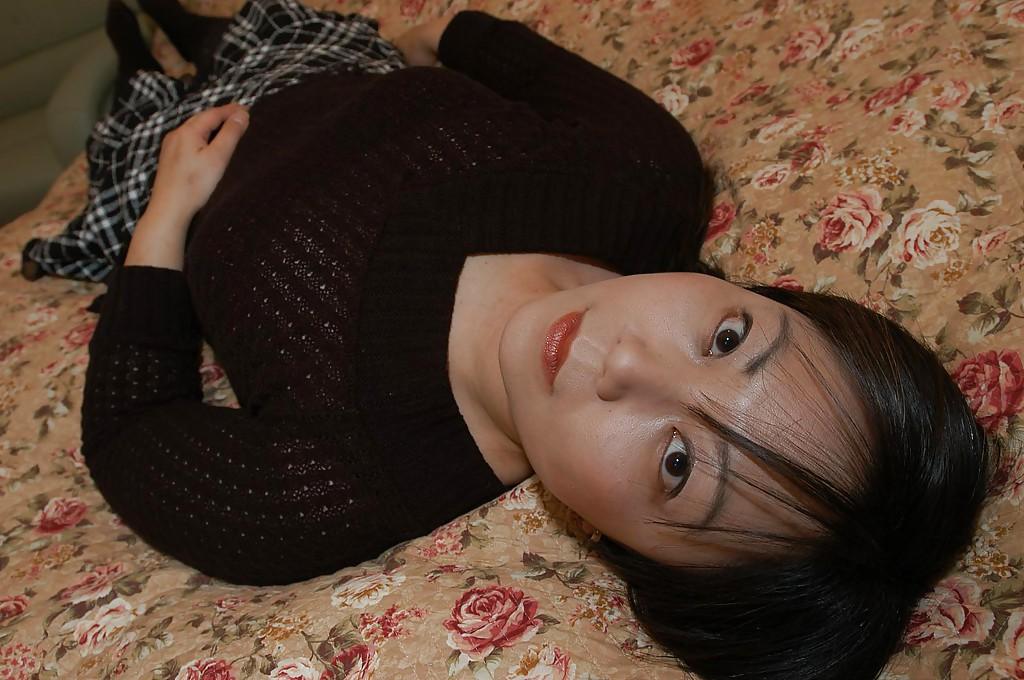 16P Chubby asian MILF Rumi Yasumoto undressing and toying her love holes