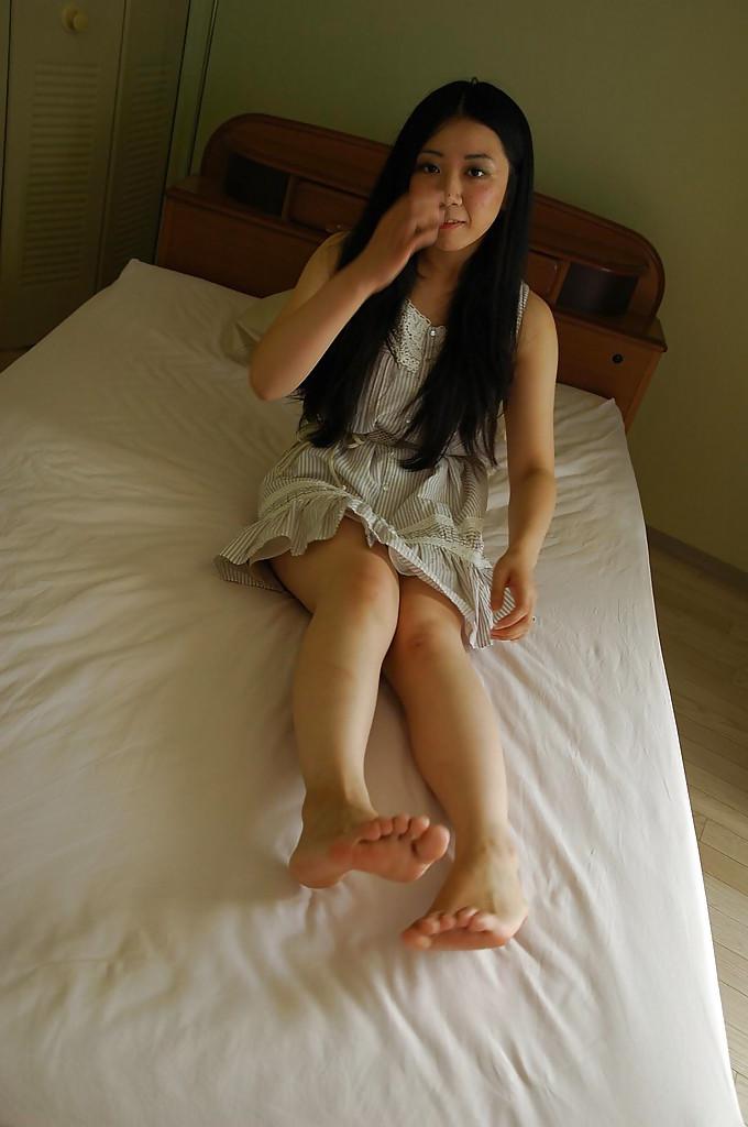 16P Asian teen Jun Matsubara undressing and spreading her lower lips