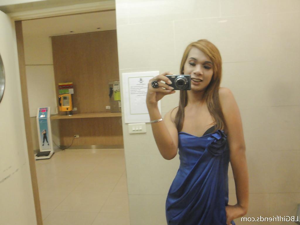 16P Thin Asian ladyboy Nano taking self shots of small tits and hairy dick