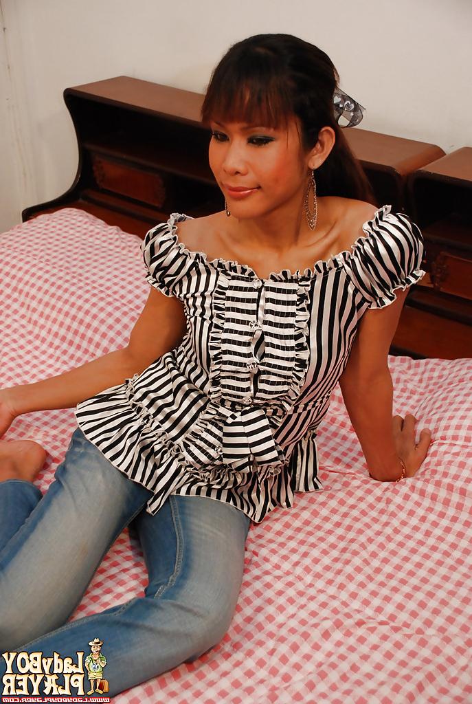 16P Asian ladyboy Pim models fully clothed before exposing hung shecock