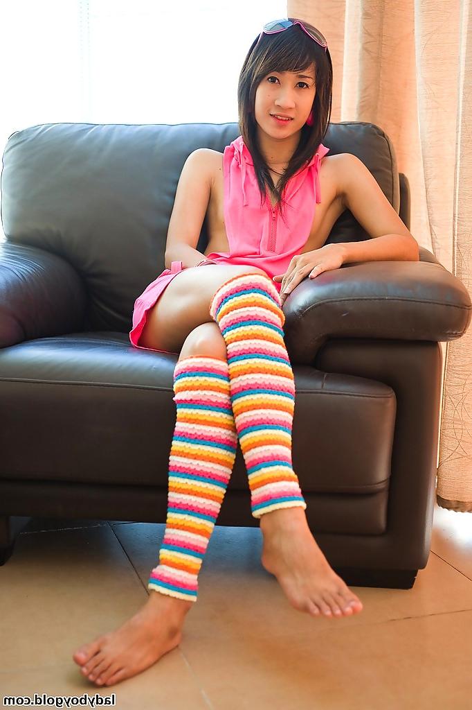 16P Teen ladyboy Ood plays with small tits with sexy legs adorned in socks