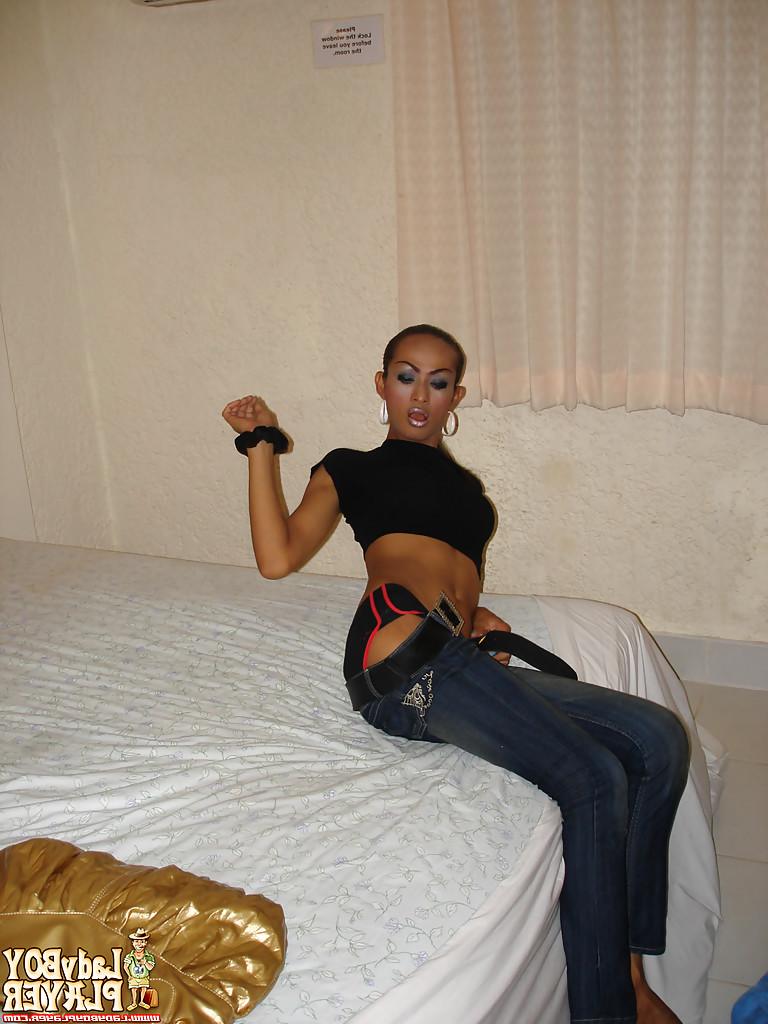 16P Solo ladyboy model Sara removing jeans and panties before masturbating