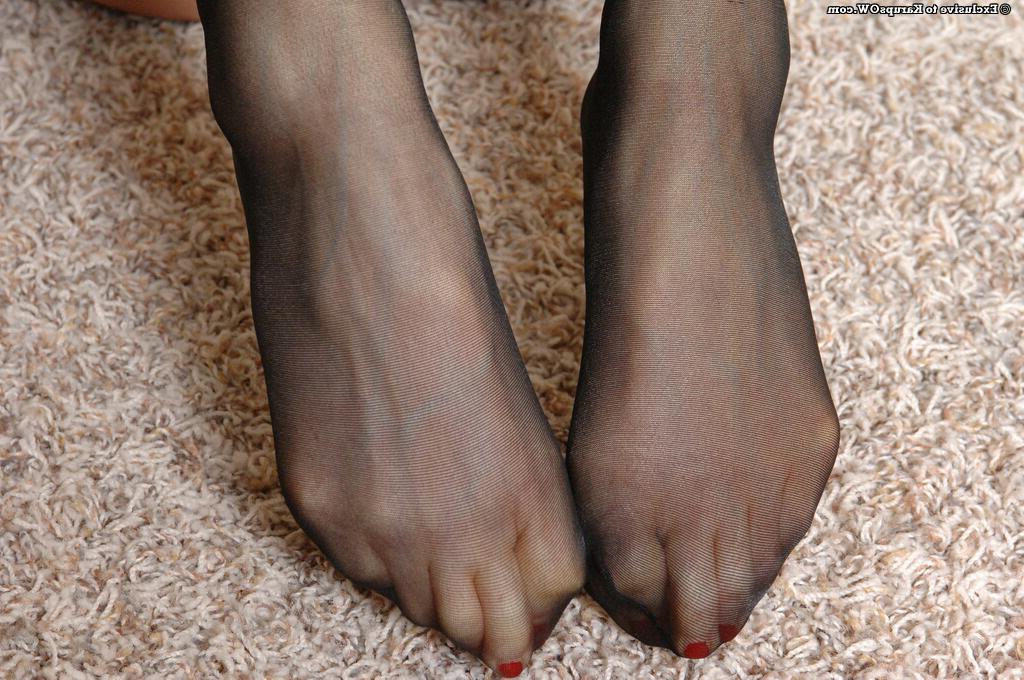 16P Lusty mature maid exposing her nylon clad feet and hairy pussy