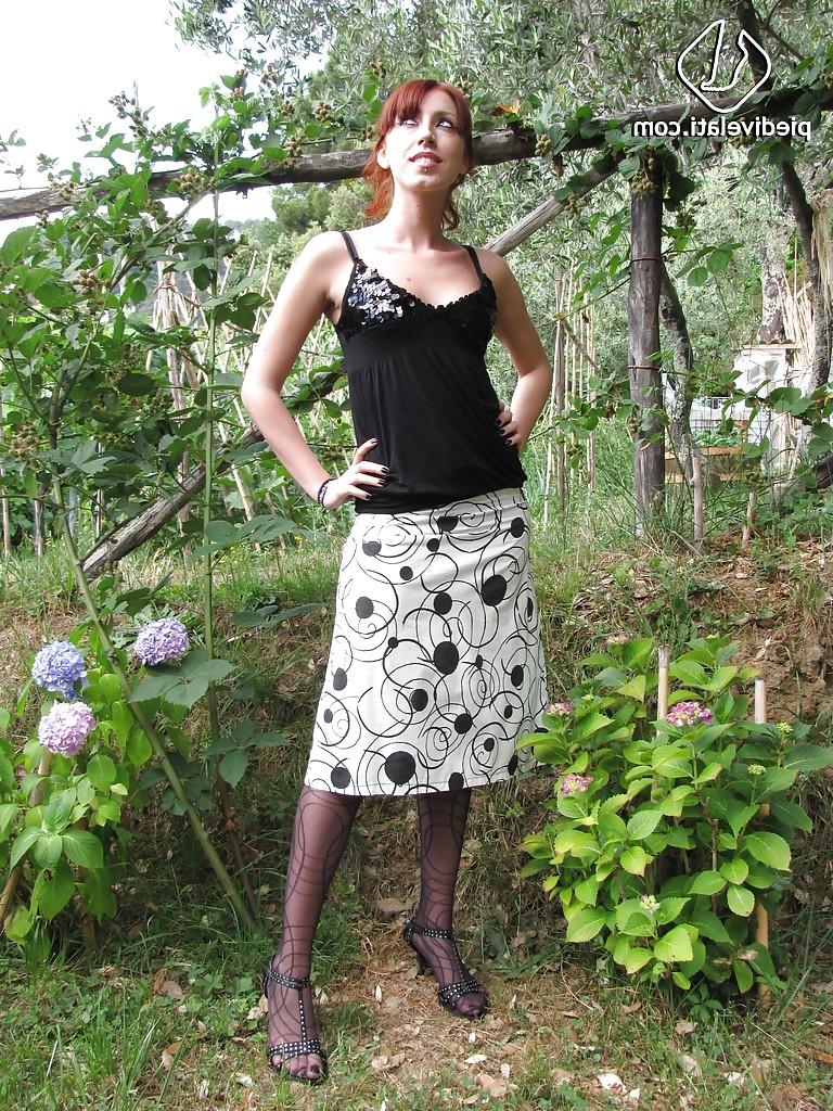16P Redhead stunning girl Rosella is showing her wonderful legs