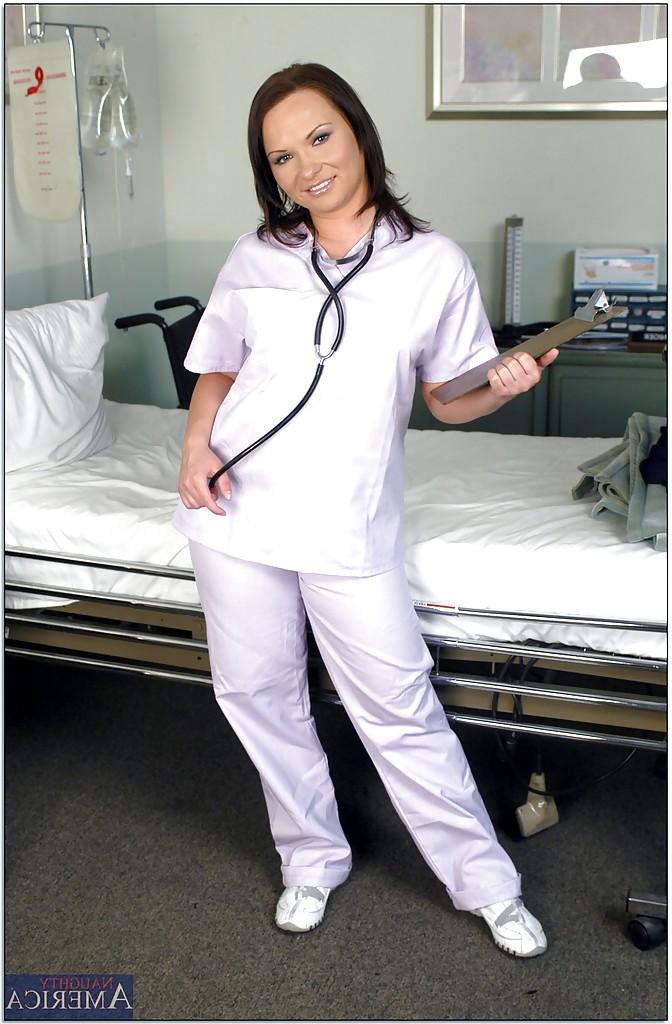 16P Hot babe in sexy nurse uniform Katja Kassin exposing bubble butt