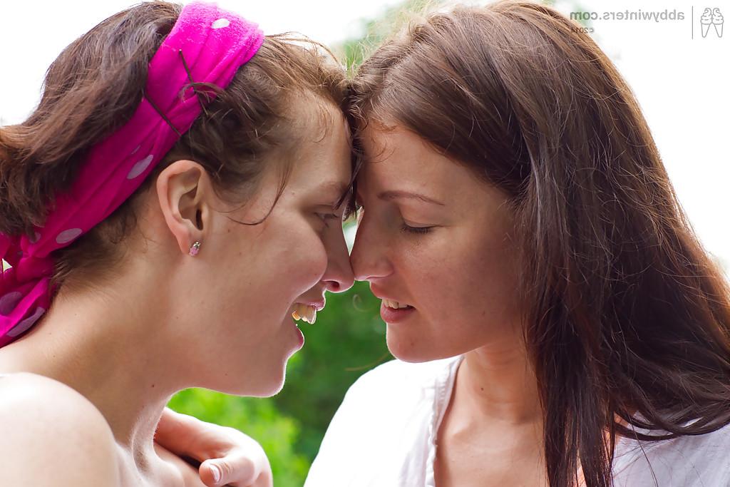 16P Young chicks Gina J and Immie tongue kiss and lap hairy pussy outside